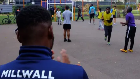 BBC Youngsters play football on the Avondale Square Estate