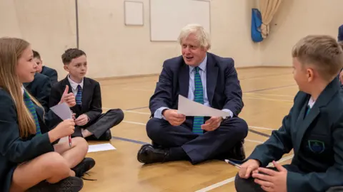 Reuters Boris Johnson visits Castle Rock School