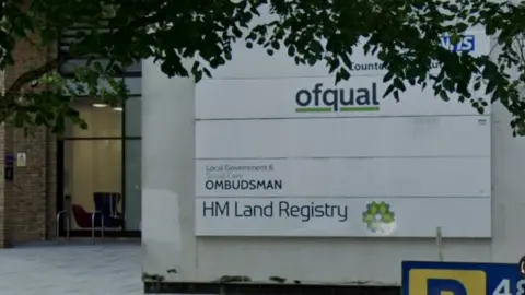 Google Part of business park in Coventry, with the Ombudsman's office on a name plaque