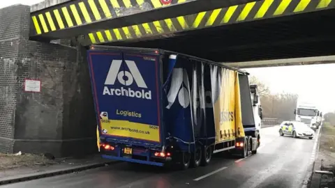 Sweet Treats Lorry stuck under bridge on A5 in Hinckley