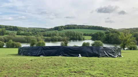 Justin Dealey/BBC The hole that has opened up in the ground near Little Missenden, Buckinghamshire