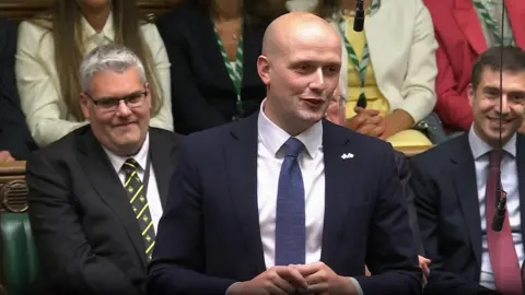 PA Media SNP Westminster leader Stephen Flynn speaking in the House of Commons