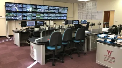 Local Democracy Reporting Service Wrexham CCTV control room with multiple screens