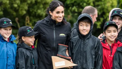 Getty Images Meghan winning at welly-wanging