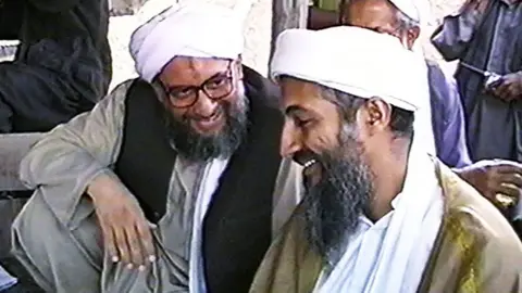 CNN via Getty Images Ayman al-Zawahiri and Osama bin Laden after a press conference on May 26, 1998