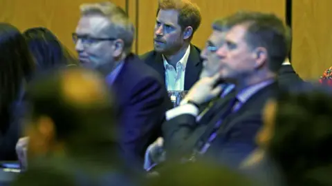 PA Media Prince Harry at conference