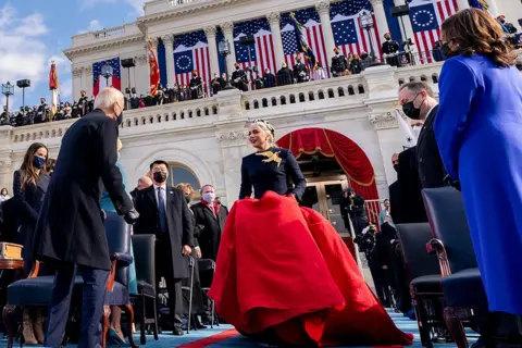 Reuters Lady Gaga arrives to perform the National Anthem as President-elect Joe Biden and Vice President-elect Kamala Harris watch during the 59th Presidential Inauguration at the U.S. Capitol, in Washington DC, 20 January 2021.