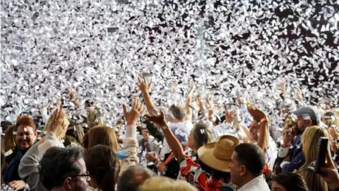 Reuters Supporters of Colombian left-wing presidential candidate Gustavo Petro of the Historic Pact coalition react after he came out on top in the first round of the presidential election in Bogota, Colombia May 29, 2022.