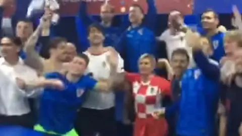 Facebook/Kolinda Grabar-Kitarovic Croatia's president celebrates quarter final success in the team dressing room