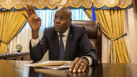 Getty Images Jovenel Moise, Haiti's president, speaks during an interview in Port-Au-Prince, Haiti, on Monday, Jan. 29, 2018.