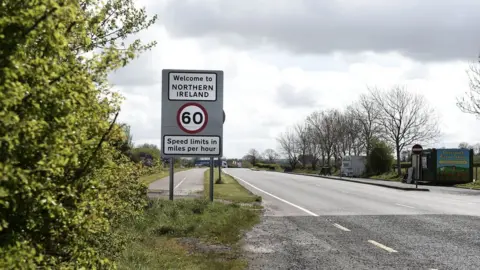 Getty Images A welcome to Northern Ireland road sign signalling the crossing of the border between north and south