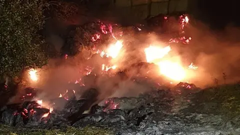 Derbyshire Fire and Rescue Service Hay bales on fire in Denby