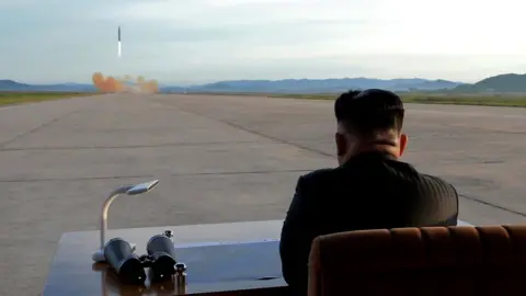 Reuters Kim Jong-un watches a missile launch from North Korea, 16 September