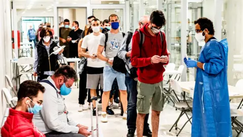 Getty Images Queuing at an airport in Cyprus