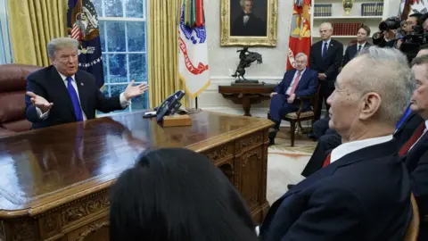 EPA US President Donald J. Trump (L) talks with Vice Premier of the People"s Republic of China Liu He (R) during a meeting in the Oval Office of the White House in Washington, DC, USA, 22 January 2019.