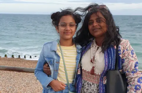 Farah Sayeed Farah and her daughter