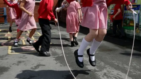 PA Media Generic photo of children in a school playground