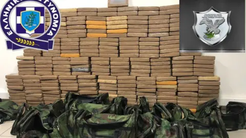 Hellenic Police Bags and a large pile of packages allegedly containing cocaine