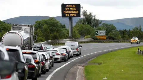 Reuters Traffic queuing on the main Belfast to Dublin road, outside Newry