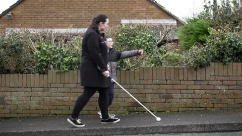 Rhian and Harley on the walk to school