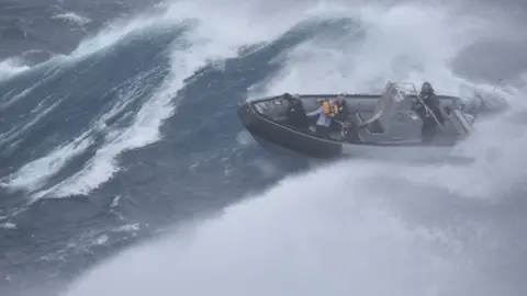 New Zealand Defence Force Frigate HMNZS Te Mana has rescued a sailor from a catamaran in distress during Cyclone Gabrielle.