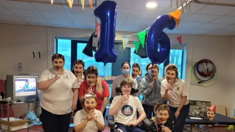 Family photo Celebrations for James's 16th birthday in hospital