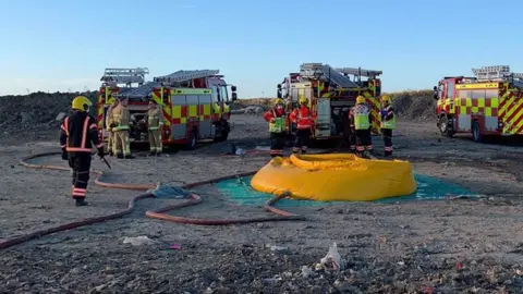 Cambridgeshire Fire and Rescue Service Smoke rising over Milton recycling centre