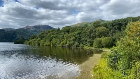 BBC The part of Ullswater near where the paddleboarder went missing