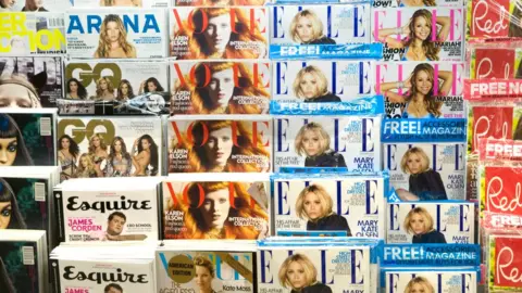 Alamy Magazine rack in a newsagent