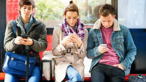 Getty Images People on mobile