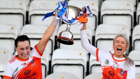 Armagh's joint-captains Orlagh Murray and Rachael Merry celebrate after the county's All-Ireland Premier Junior title triumph over Cavan on Saturday