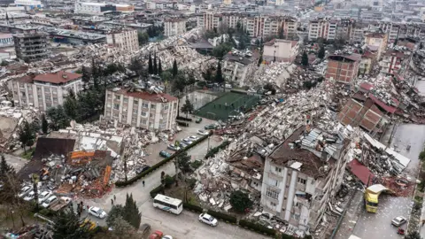 Getty Images An aerial view of debris of collapsed buildings in Hatay