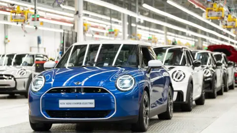 Joe Giddens The new Mini Cooper Electric on the production line at the BMW Mini plant at Cowley in Oxford