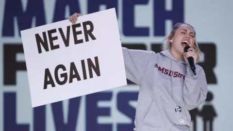 EPA Miley Cyrus sings The Climb during the March For Our Lives rally in Washington, DC, 24 March 2018