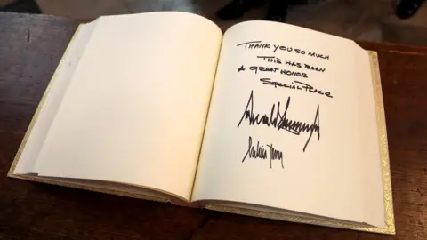 Getty Images Donald Trump's signature in the Westminster Abbey distinguished visitors' book