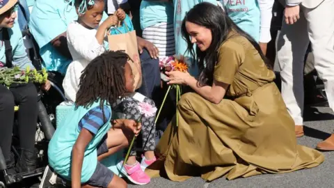 Getty Images Meghan greets a well-wisher