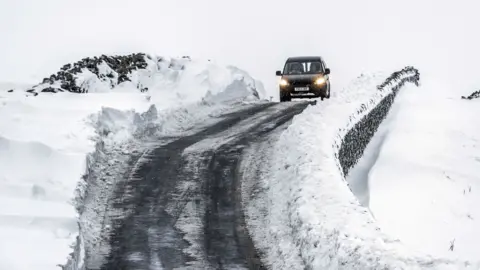 PA A car in snowy conditions