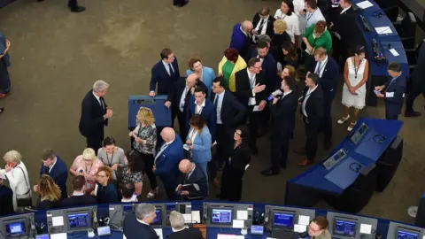 Getty Images Members of the European Parliament queue to vote in the election of the new president during the first plenary session of the newly elected European Assembly, 3 July 2019