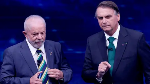 Getty Images President Jair Bolsonaro and former President Luiz Inácio Lula da Silva in debate