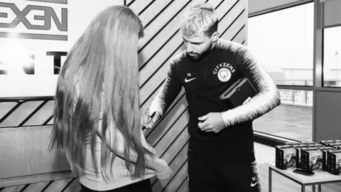 Liv Lang Sergio Aguero signing Liv's shirt