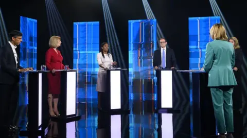 Getty Images Sunak, Truss Badenoch, Tugendhat, and Mordaunt take part in the ITV debate