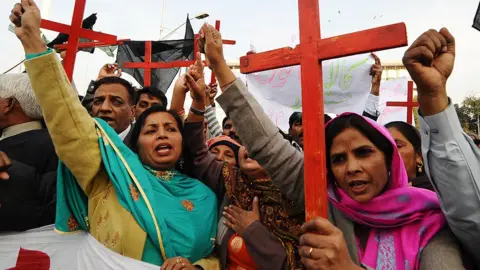 Arif Ali/AFP/Getty Images Members of the Pakistan Christian Democratic alliance march during a protest in Lahore in support of Asia Bibi. File photo