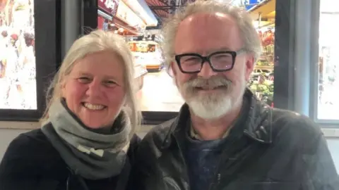 Mike Merchant Jane Opher and her partner