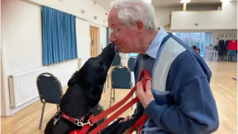 Bill, a veteran, with his Service Dog, Patch