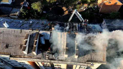 Reuters State Emergency Service of Ukraine via Reuters. Building destroyed during a Russian missile strike, amid Russia's attack on Ukraine, in Lviv, Ukraine August 15, 2023.