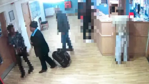 CPS Msokeri captured on CCTV while checking her 'husband' into a mental health ward