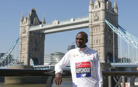 AFP Men's elite runner Ethiopia's Kenenisa Bekele poses during a photocall for the London marathon by Tower Bridge in central London on April 19, 2018.