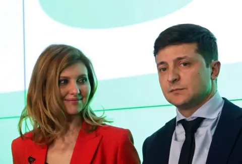 Getty Images Olena Zelenska and Volodymyr Zelensky as exit polls came out indicating he had made it to the final round of the 2019 presidential election