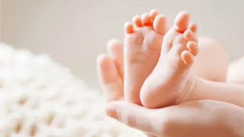 Liudmila_Fadzeyeva Baby's feet
