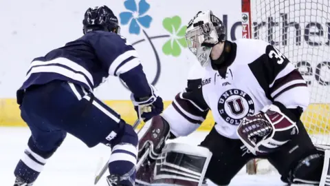 Darion Hansen of Union College in action against Yale's Jack St Ivany